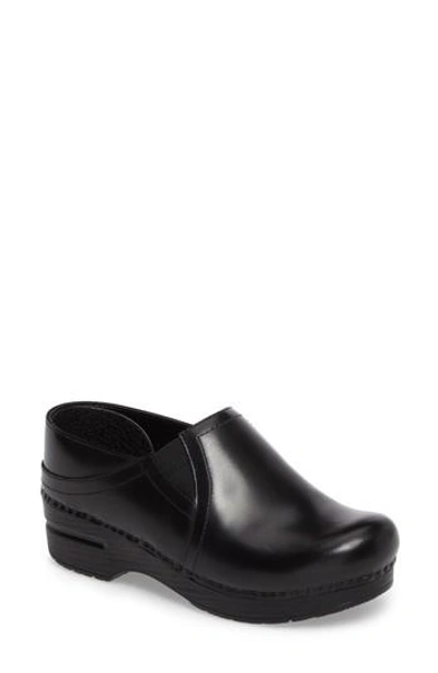 Shop Dansko Pepper Clog In Black Cabrio