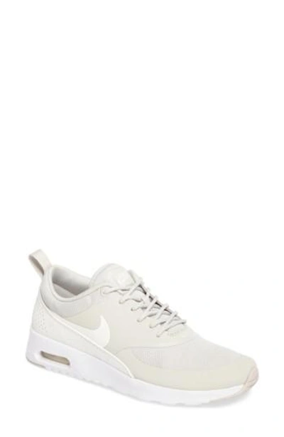 Shop Nike Air Max Thea Sneaker In Light Bone/ Sail/ White