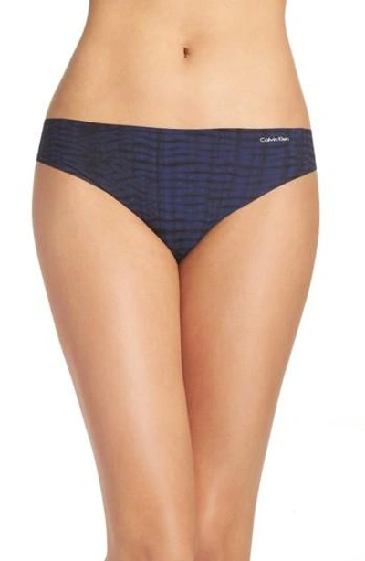 Shop Calvin Klein Invisibles Thong In Mysterious Skin