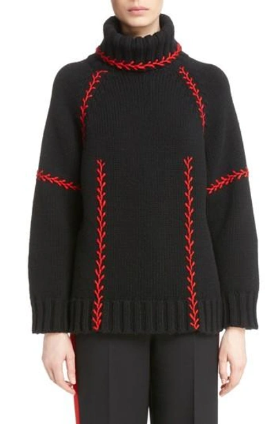 Shop Alexander Mcqueen Stitch Detail Cashmere Turtleneck Sweater In Black/ Red