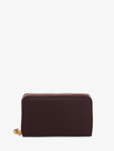 Shop Alexander Mcqueen Medium Zip-around Continental Wallet In Oxblood