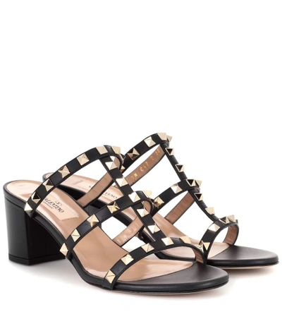 Shop Valentino Rockstud Leather Sandals In Black