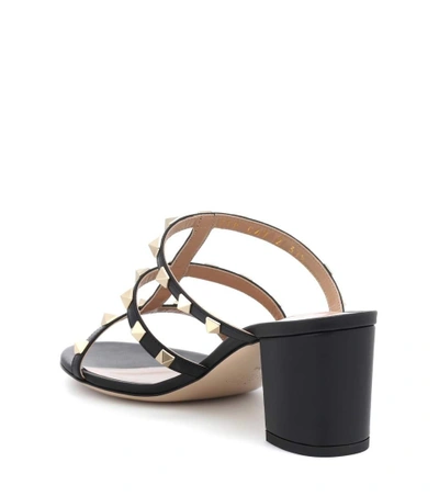 Shop Valentino Rockstud Leather Sandals In Black