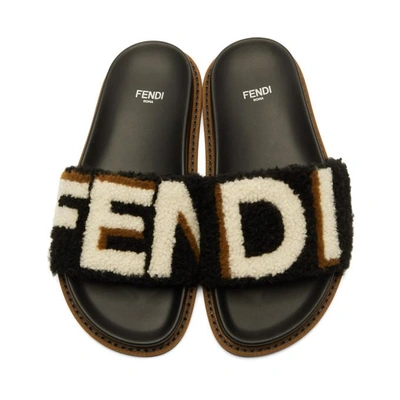 Shop Fendi Black Shearling Logo Slides In F10gj Black