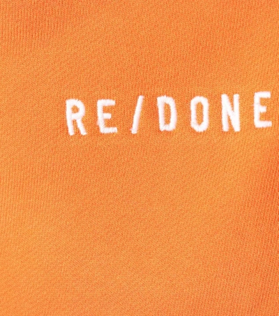 Shop Re/done Reverse Weave Cotton Hoodie In Orange