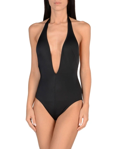 Shop Solid & Striped One-piece Swimsuits In Black