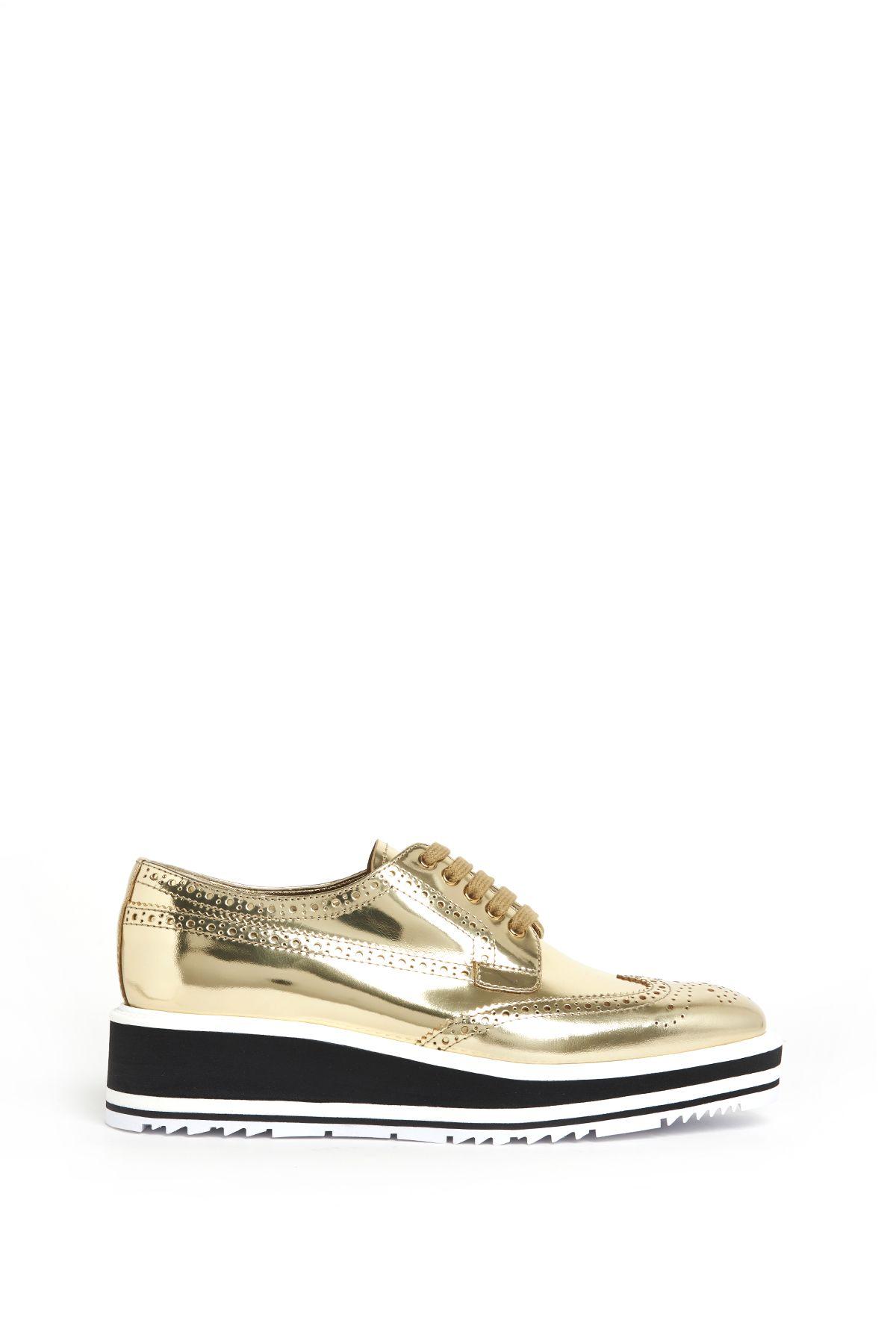 prada shoes gold