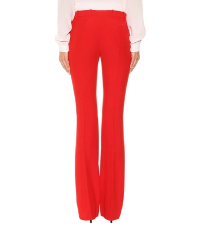 Shop Alexander Mcqueen Flared Crêpe Pants In Red