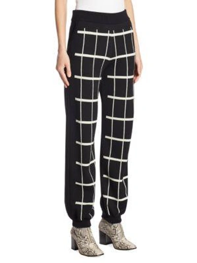 Shop Chloé Check Wool Knit Track Pants In Black