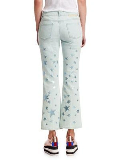 Shop Stella Mccartney Star-print Cropped Jeans In Sun Faded Blue