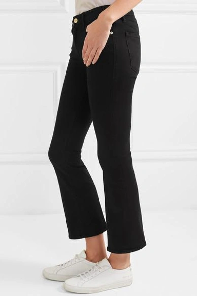 Shop Frame Le Crop Mini Mid-rise Bootcut Jeans In Black