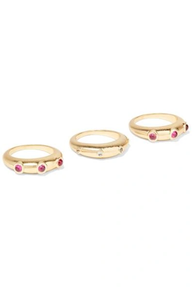 ELIZABETH AND JAMES PHOENIX SET OF THREE GOLD-PLATED, RUBY AND TOPAZ RINGS 
