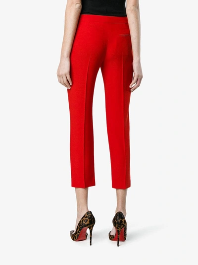 Shop Alexander Mcqueen Mid Rise Slim Fit Cropped Trousers In Red