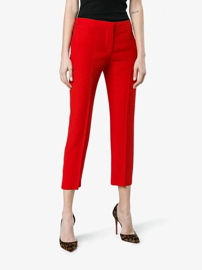 Shop Alexander Mcqueen Mid Rise Slim Fit Cropped Trousers In Red