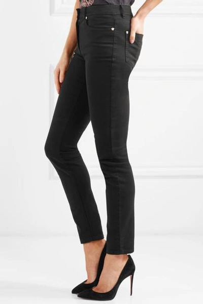 Shop Versace Mid-rise Skinny Jeans In Black