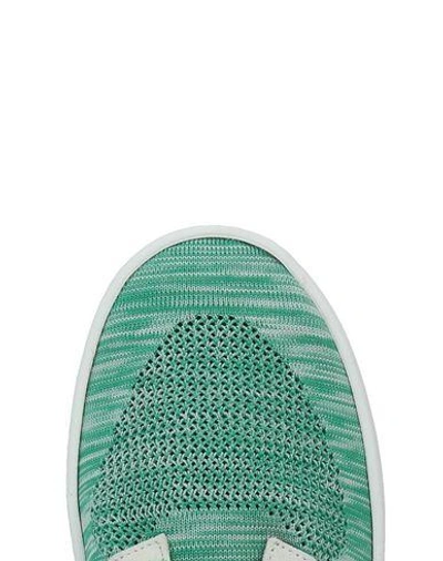 Shop Volta Trainers In Green