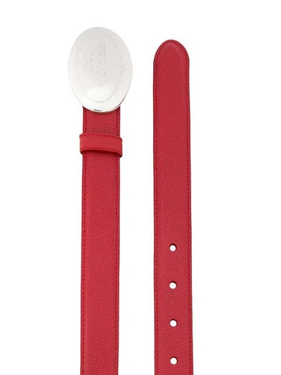 Shop Prada Oval Engraved Buckle Belt In Red