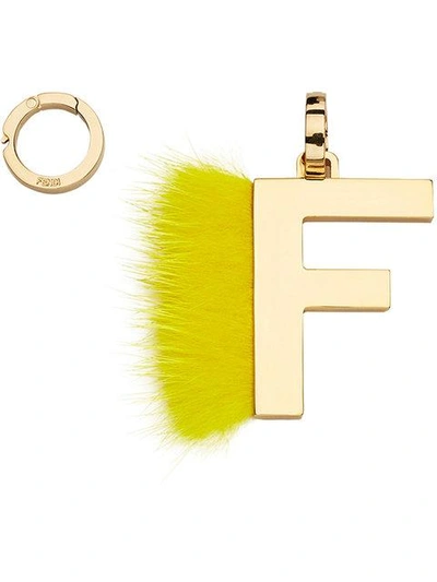 Shop Fendi Abclick F Pendant Charm In Yellow