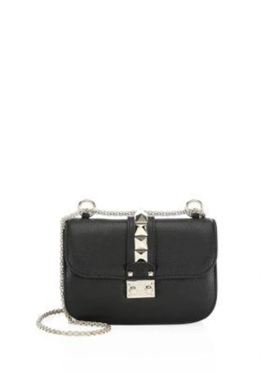 Shop Valentino Garavani Small Rocklock Leather Crossbody Bag In Black