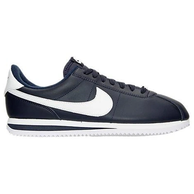 Shop Nike Men's Cortez Basic Leather Casual Shoes, Blue