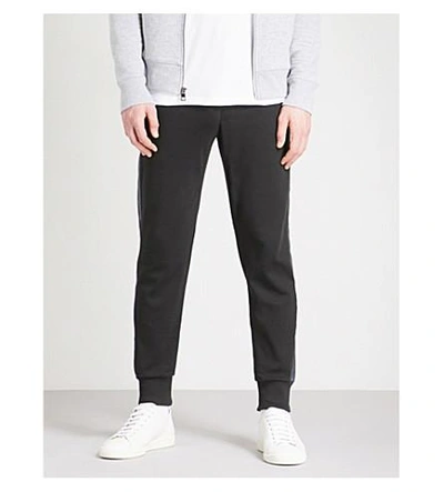 Shop Michael Kors Tape-trim Tapered Cotton-jersey Track Pants In Black