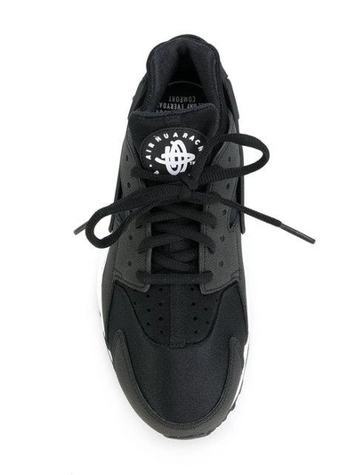 Shop Nike Air Huarache Sneakers In Black