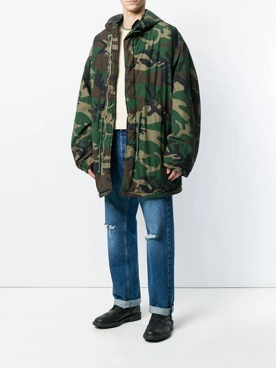 Shop Yeezy Camouflage Oversized Parka In Green