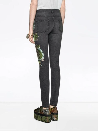 Shop Gucci Dragon Embroidered Denim Skinny Jeans In Black