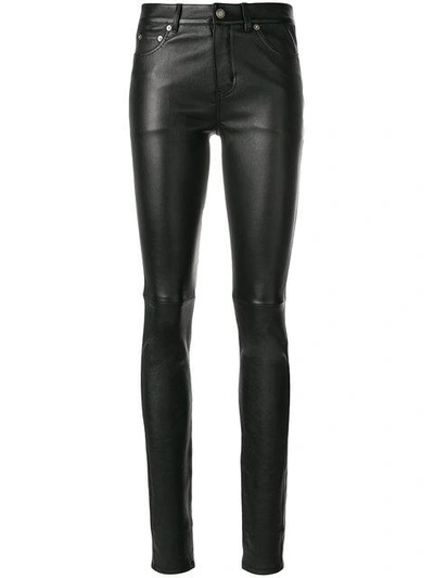 Shop Saint Laurent Skinny Leather Trousers In Black