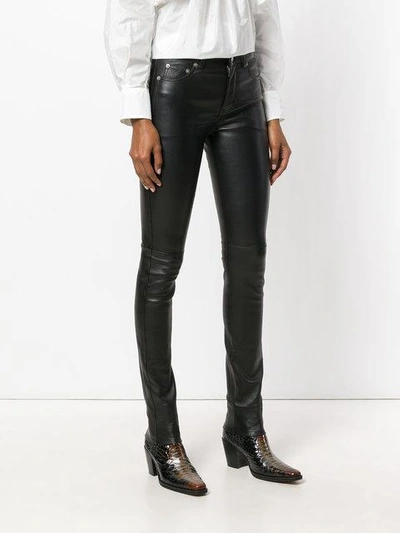 Shop Saint Laurent Skinny Leather Trousers In Black