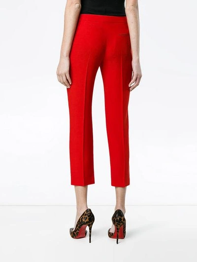 Shop Alexander Mcqueen Mid Rise Slim Fit Cropped Trousers - Red