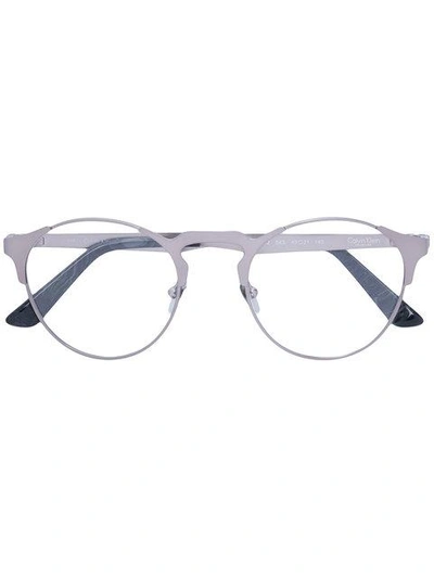 Shop Calvin Klein Round Frame Glasses