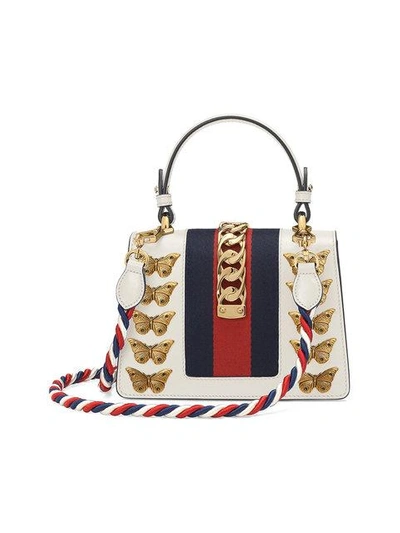 Shop Gucci Sylvie Animal Studs Leather Mini Bag - White