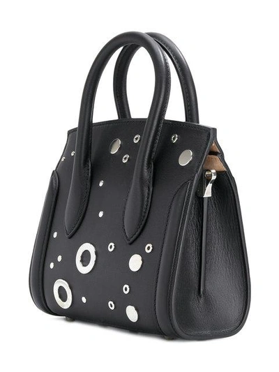 Shop Alexander Mcqueen Eyelet Embellished Mini Tote In Black