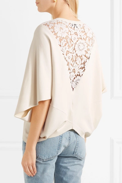 Shop Valentino Lace-paneled Jersey Poncho In Ivory