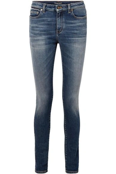 Shop Saint Laurent Distressed Mid-rise Skinny Jeans In Mid Denim