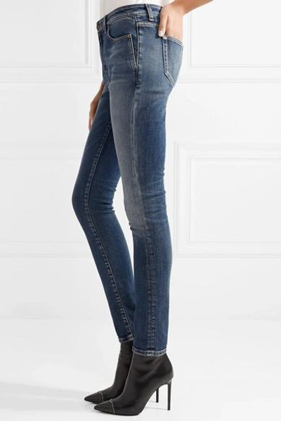 Shop Saint Laurent Distressed Mid-rise Skinny Jeans In Mid Denim