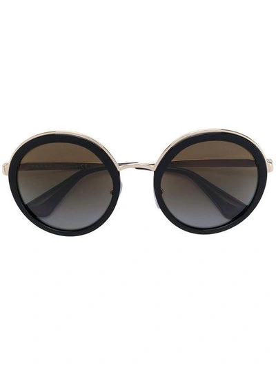 Shop Prada Eyewear Round Oversized Sunglasses - Black