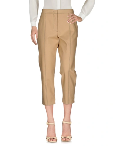Shop Msgm Cropped Pants & Culottes In Beige