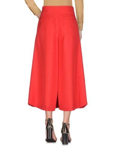 Shop Valentino Casual Pants In Red