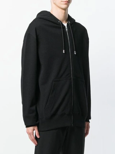 Shop Versus Rear Logo Hooded Jacket In Black