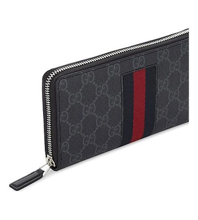 Shop Gucci Supreme Zip Around Wallet In Red Black
