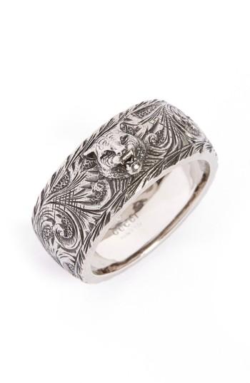 thin silver ring with feline head