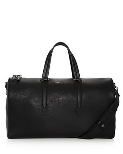 Shop Ferragamo Firenze Pebbled Leather Matte Duffel Bag In Black