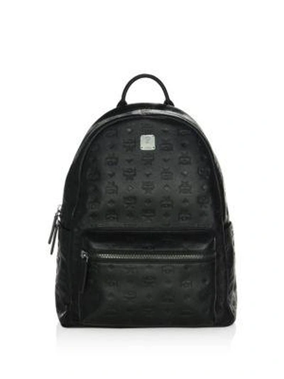 Shop Mcm Monogram Leather Backpack In Black