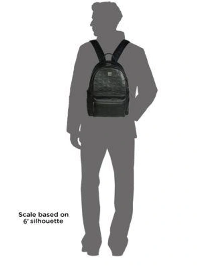 Shop Mcm Monogram Leather Backpack In Black