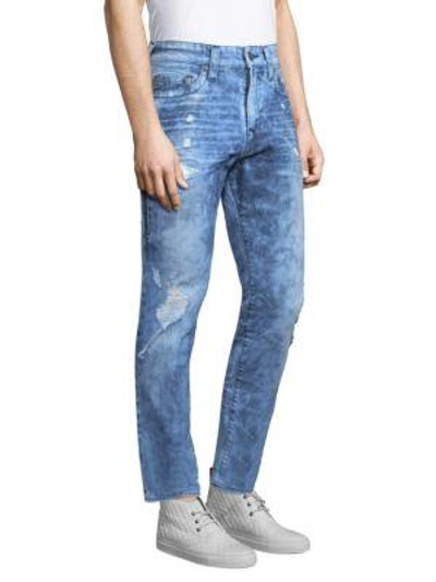 Shop True Religion Tapered Distressed Skinny Fit Jeans In Light Blue
