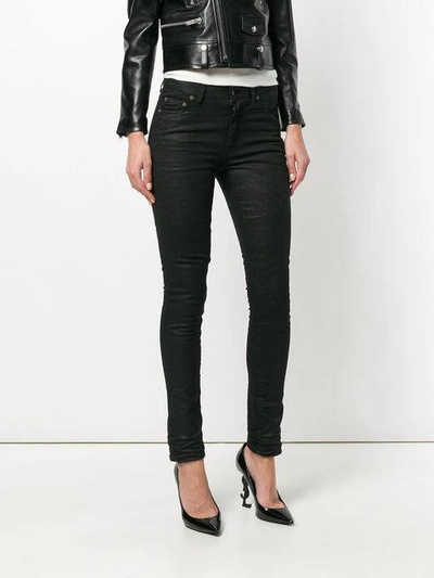 Shop Saint Laurent Classic Skinny Jeans - Black