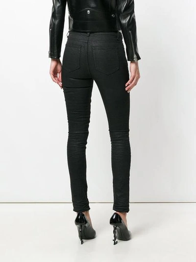 Shop Saint Laurent Classic Skinny Jeans - Black