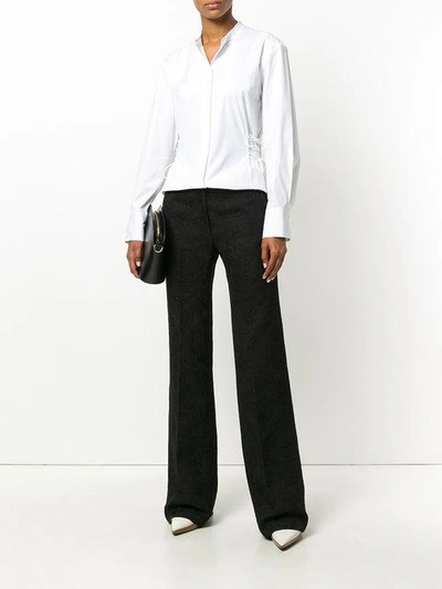 Shop Theory Flared Jacquard Trousers In Black